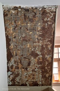 Different generations of wallpapers that were used in the house over multiple centuries.