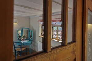 Look at the dressing table through the mirrors of the wardrobe